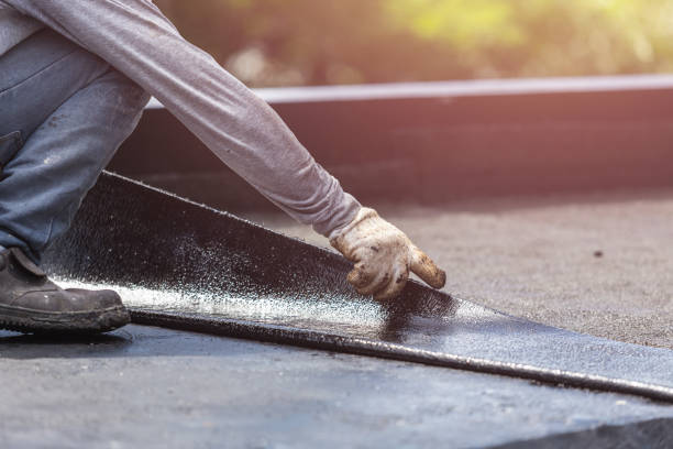 Professional Waterproofing technician working in Skaneateles Falls, NY